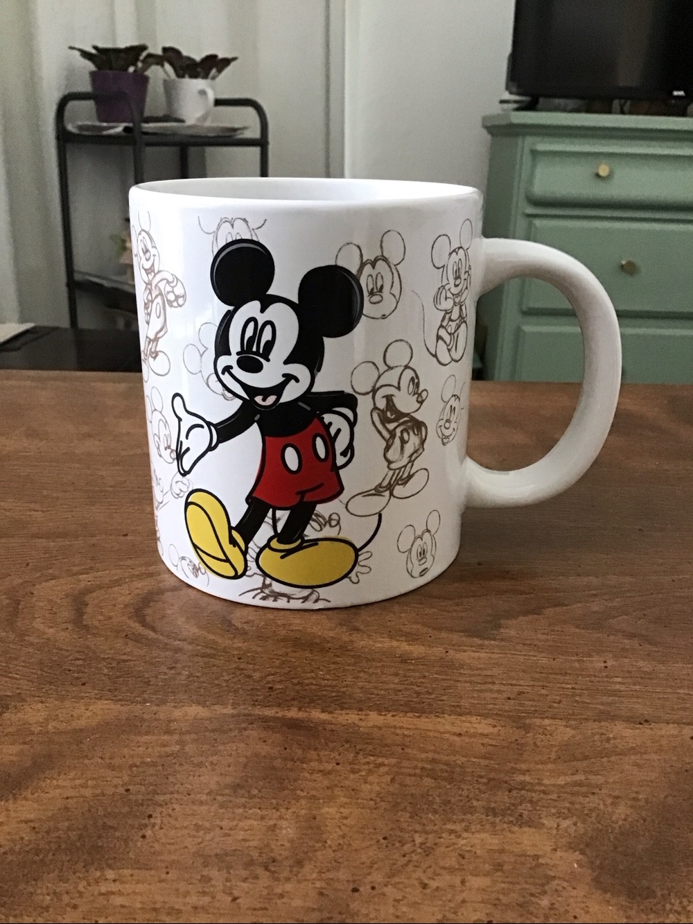 Vintage Disney Store Mickey Mouse Through the Years 2003 coffee mug.